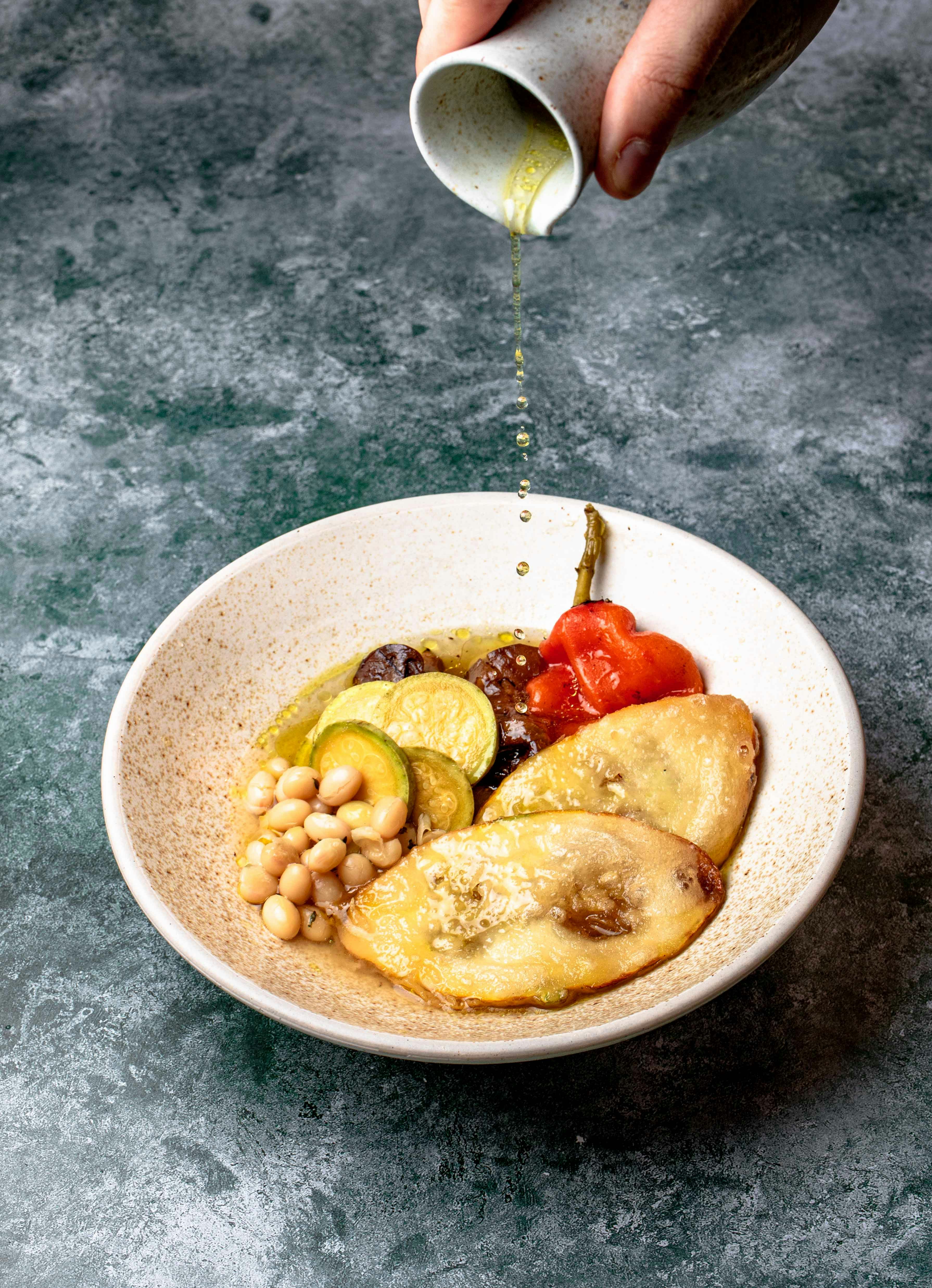 red and yellow fruits on white ceramic plate